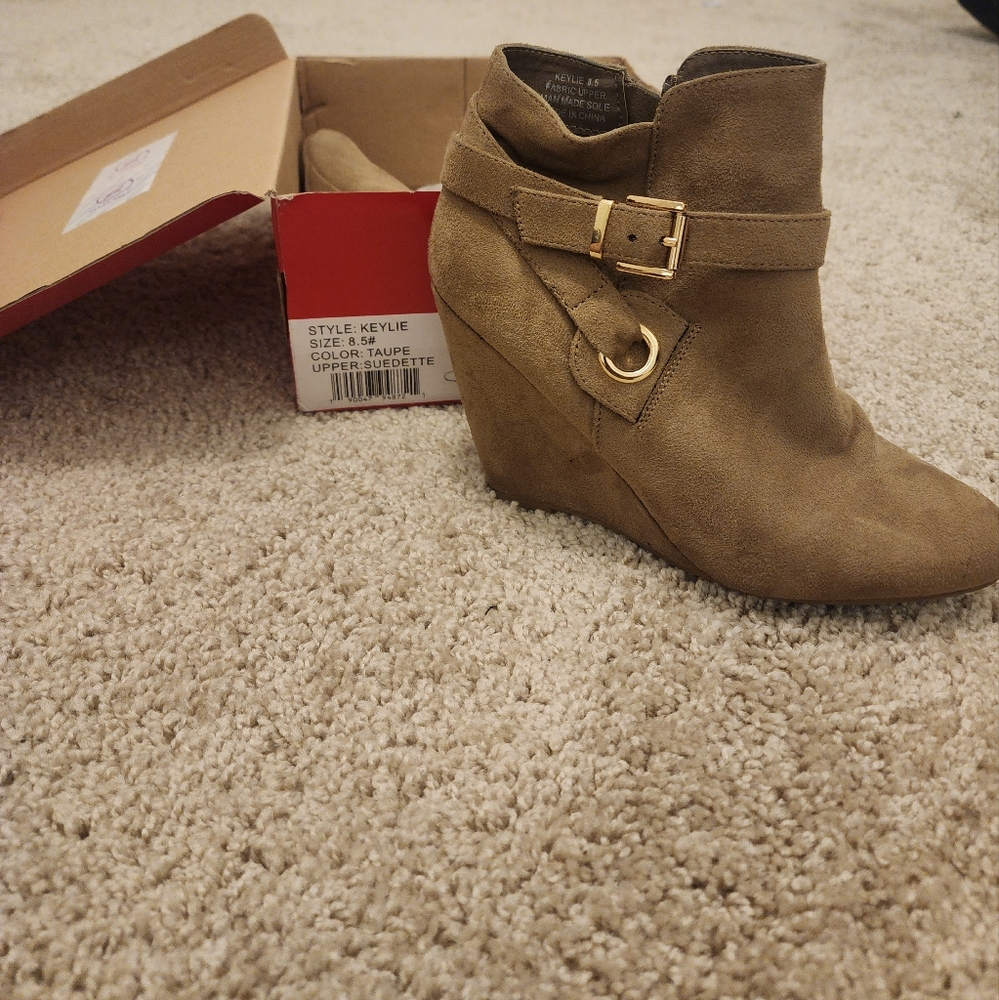 Woman's suede wedge booties